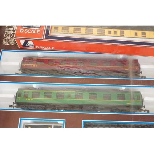 1289 - A Lima 0 gauge battery operated train set, together with two additional boxed coaches and a boxed co... 