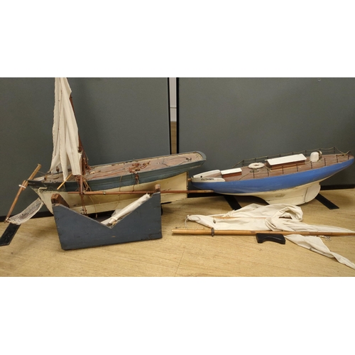 1296 - Two large over-painted pond yachts, largest 91cms