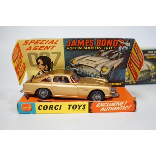 1306 - Corgi Toys James Bond's Aston Martin (261) in gold, boxed with driver, passenger, inner display tray... 