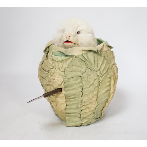 1307 - A Roule de Camp rabbit automaton in lettuce, 19cm high