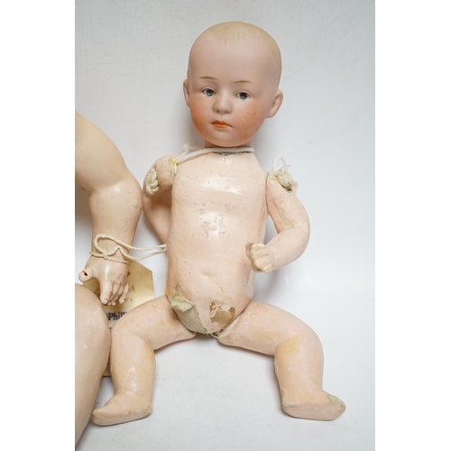 1314 - A Schutzmeister & Quendt bisque character doll, German, circa 1920 impressed 201, entwined SQ 6, wit... 