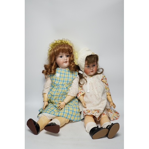 1317 - A Kestner JDK 168 bisque doll, 65cm and an AM390 doll with bisque head, 65cm