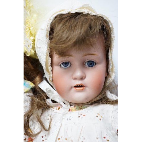 1317 - A Kestner JDK 168 bisque doll, 65cm and an AM390 doll with bisque head, 65cm