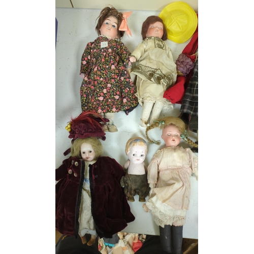 1318 - Nine assorted dolls including AMS and Kewpie