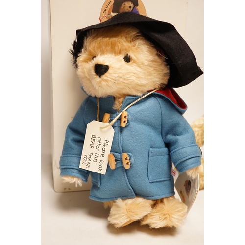 1321 - A Steiff Paddington 26cm box and certificate together with a yellow tag Steiff