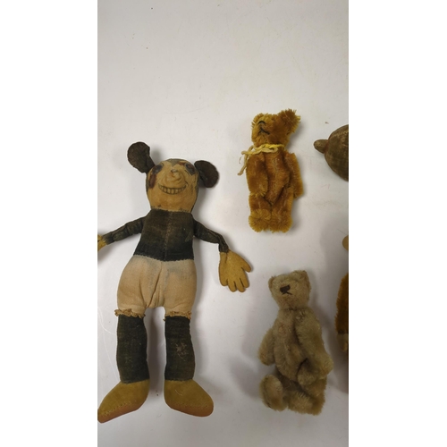 1326 - Deans Mickey Mouse and a group of Schuco and Schuco type toy animals (8)