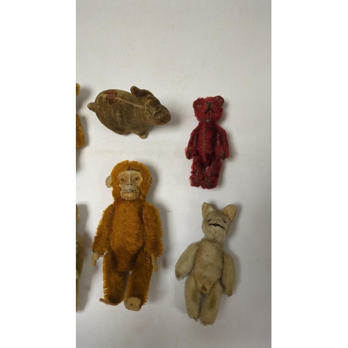 1326 - Deans Mickey Mouse and a group of Schuco and Schuco type toy animals (8)