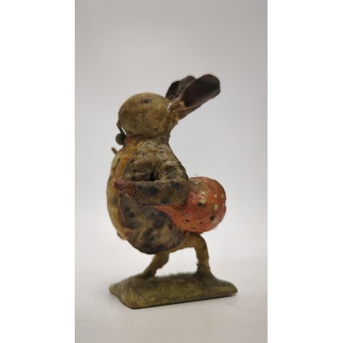 1330 - An F. Warne papier-mâché Beatrix Potter figure of Benjamin Bunny with pipe and red handkerchief bag,... 