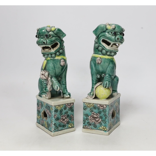 1359 - A pair of small early 20th century Chinese figures of Buddhist lions, 15.5cm high