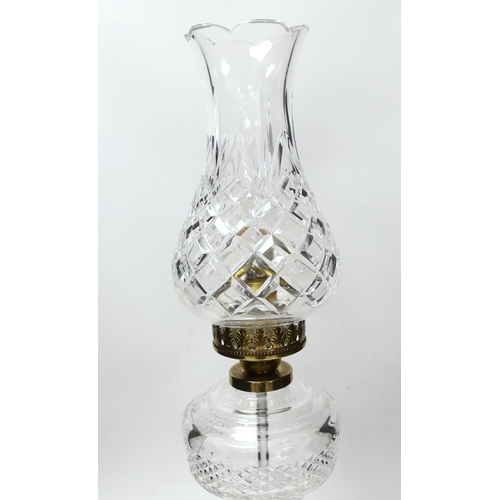 1376 - A Waterford cut glass table lamp and shade , 56cm high