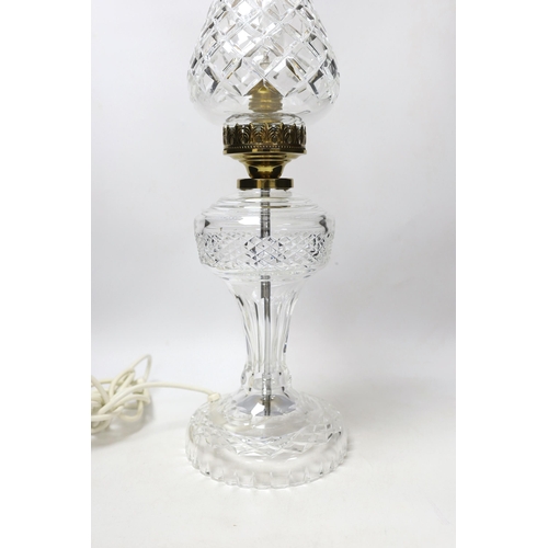 1376 - A Waterford cut glass table lamp and shade , 56cm high