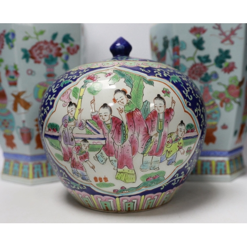 1383 - A pair of Chinese famille rose vases and a similar jar and cover, 38cm