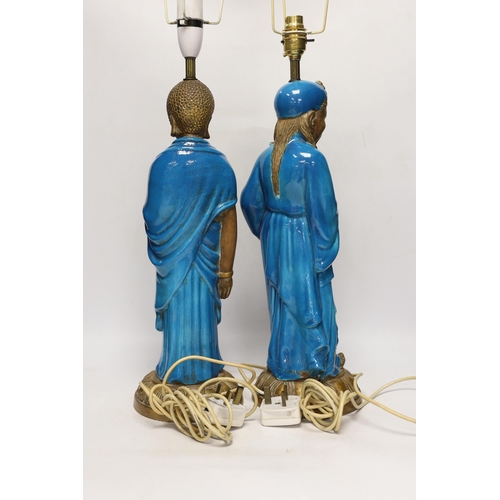 1385 - Two Chinese decoratively glazed and gilded pottery figures converted to lamp bases, approximately 44... 