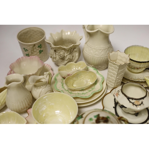 1386 - A quantity of Belleek porcelain tea and decorative wares, 1st period and later