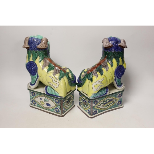 1388 - A pair of large 20th century Chinese or Samson enamelled porcelain figures of Buddhist Lions, 24cm... 