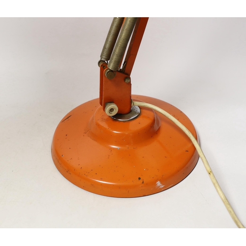 1392 - An orange Thousand and One Lamps Ltd angle poise lamp, approximately 76cm high