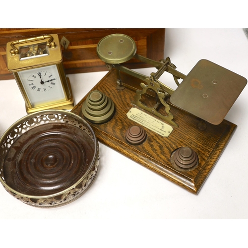 1396 - Letter scales and weights, a inlaid box, a carved box, a pair of plated coasters, carriage clock, in... 