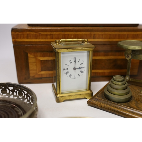 1396 - Letter scales and weights, a inlaid box, a carved box, a pair of plated coasters, carriage clock, in... 