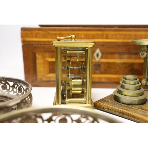 1396 - Letter scales and weights, a inlaid box, a carved box, a pair of plated coasters, carriage clock, in... 