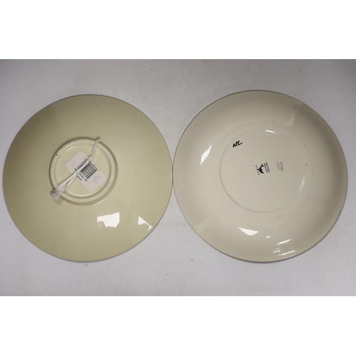 1399 - Three Poole Pottery Delphis wall plates, 25cm