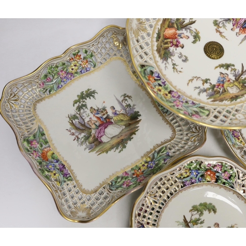 1401 - A Dresden Meissen style part dessert set, painted with courting couples in the landscape, consisting... 