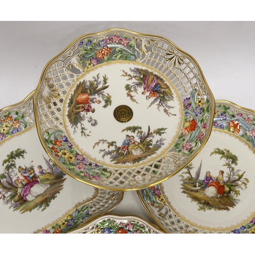 1401 - A Dresden Meissen style part dessert set, painted with courting couples in the landscape, consisting... 