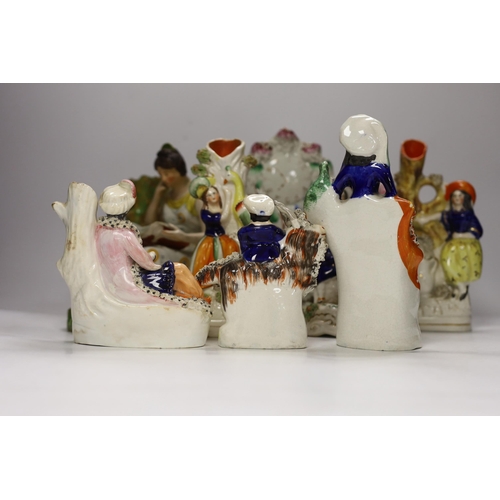 1404 - An early 19th century Staffordshire pearlware figure of a seated lady and seven mid 19th century Sta... 