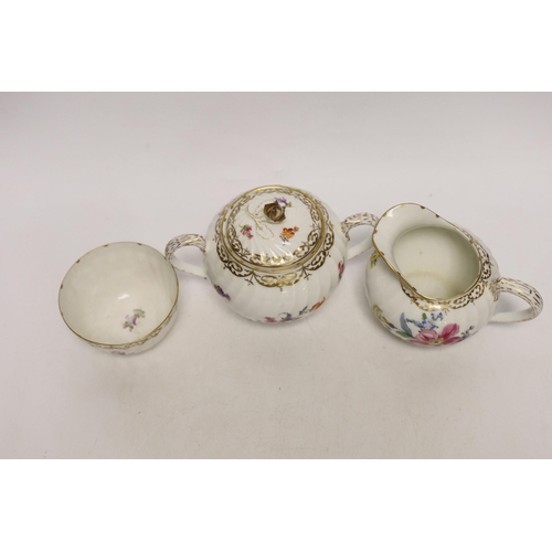 1408 - A Nymphenburg floral decorated teapot, milk jug and sugar bowl, teapot 13c high