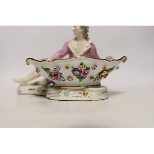 1417 - A 19th century Meissen figural sweetmeat dish with floral encrusted decoration, crossed swords mark ... 