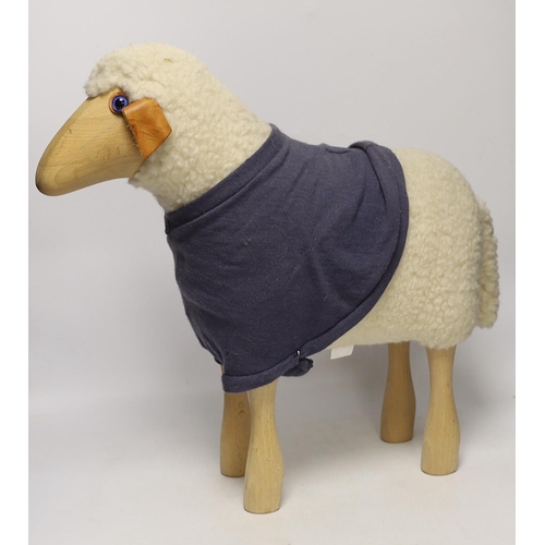 1428 - A Hanns-Peter Krafft sheep for Mayr Wool, beech body with wool and leather details, 46cm high