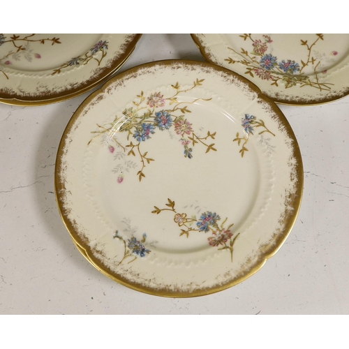 1435 - Thirteen Limoges style porcelain dessert plates, two on pedestal bases, gilt decorated with cornflow... 