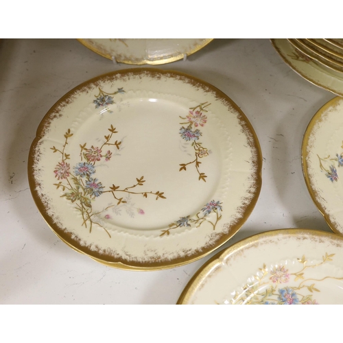 1435 - Thirteen Limoges style porcelain dessert plates, two on pedestal bases, gilt decorated with cornflow... 