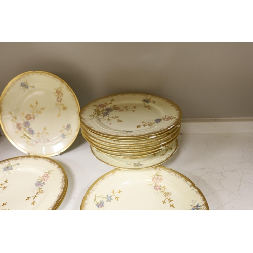 1435 - Thirteen Limoges style porcelain dessert plates, two on pedestal bases, gilt decorated with cornflow... 