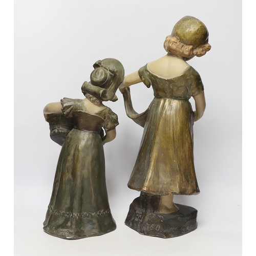 1436 - A pair of Austrian cold painted terracotta figurines, largest 45cm high