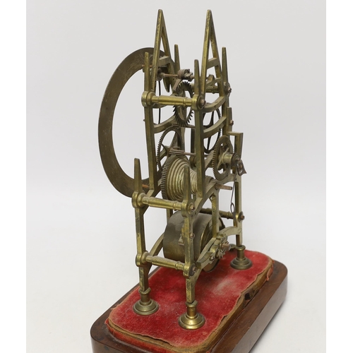 1437 - A skeleton clock with Roman numeral dial, on wooden base, 33cm high