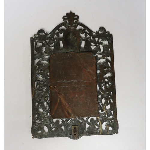 1438 - A brass framed mirror, 39cm high