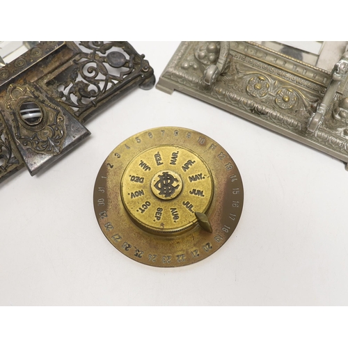 1461 - Three cast metal and cut glass ink stands, including a bronze inkwell in the form of the head of Bac... 