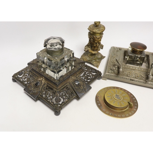 1461 - Three cast metal and cut glass ink stands, including a bronze inkwell in the form of the head of Bac... 