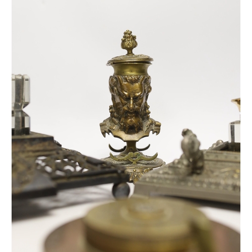 1461 - Three cast metal and cut glass ink stands, including a bronze inkwell in the form of the head of Bac... 