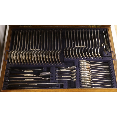 1469 - An oak canteen, plated suite of cutlery