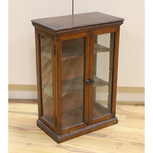 1471 - A small early 20th century glazed oak and pine two door shop display cabinet, 65.5 x 45 x 26cm... 