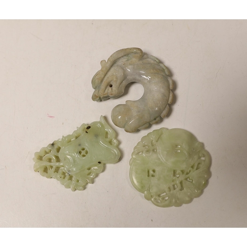 1490 - A Chinese white jade pendant plaque and three jadeite pendants, largest 7cm