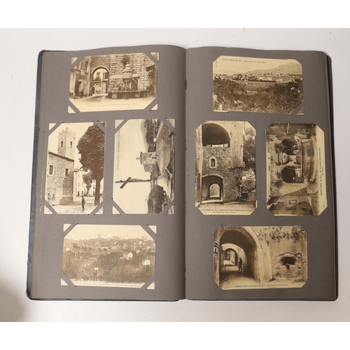 1496 - Three albums of Edwardian and later postcards and two early 20th century photograph albums, predomin... 