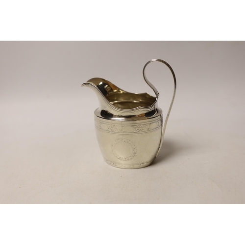 1863 - An early 19th century Irish engraved silver cream jug, crowned harp mark only, 13cm, 4.5oz.