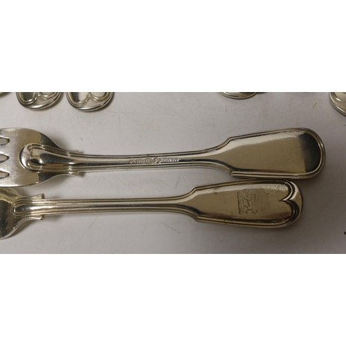 1867 - A matched set of twelve 19th century silver fiddle and thread pattern table forks, various dates and... 