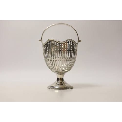 1869 - A George V pierced silver sugar basket, lacking liner, Birmingham, 1924, 15.5cm, 4.3oz.