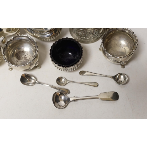 1871 - Two pairs of small silver salts, a pair of silver pepperettes, and two silver mustard pots including... 