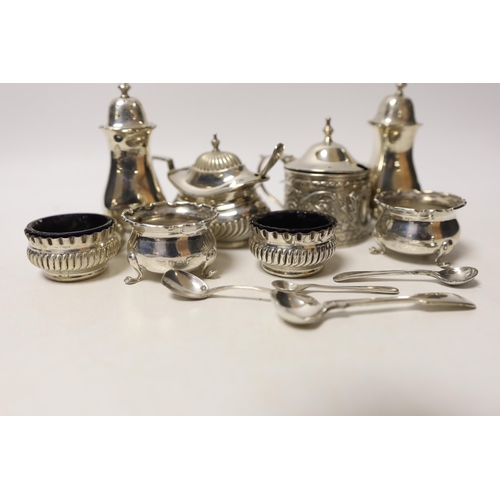 1871 - Two pairs of small silver salts, a pair of silver pepperettes, and two silver mustard pots including... 