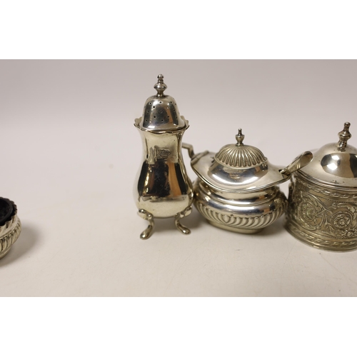 1871 - Two pairs of small silver salts, a pair of silver pepperettes, and two silver mustard pots including... 