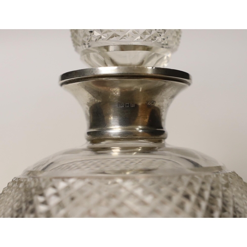 1874 - A George V silver mounted cut glass thistle shaped decanter and stopper, Wolfsky & Co Ltd, London, 1... 